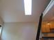 View of bright loft space, ladder access, and light from the kitchen with wood cabinets at 1405 Broadway St # 302, Boulder, CO 80302