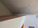 Close-up of the loft space, showing the carpeted floor and partial wall at 1405 Broadway St # 302, Boulder, CO 80302