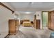 Bedroom features neutral-toned walls, carpeted floors, a window seat, and built-in storage throughout the room at 1665 W 113Th Ave, Denver, CO 80234