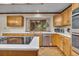 Well-appointed kitchen featuring stainless steel appliances, white countertops, and ample counter space at 1665 W 113Th Ave, Denver, CO 80234