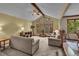 Spacious living room featuring high ceilings, large windows, and comfortable seating for relaxation and entertainment at 1665 W 113Th Ave, Denver, CO 80234
