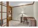 Cozy office space with built-in shelves, a modern desk, and plush carpeting at 1665 W 113Th Ave, Denver, CO 80234