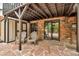 Outdoor patio with brickwork, chairs, and backyard views at 1665 W 113Th Ave, Denver, CO 80234