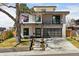 Stunning modern home with an attractive exterior, showcasing clean lines, a two-car garage, and an inviting entrance at 267 S Clermont St, Denver, CO 80246