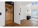 Entryway featuring an elevator, hardwood floors, and modern decor at 267 S Clermont St, Denver, CO 80246
