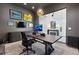 Modern office with glass walls, a dark-wood desk, stylish lighting, and a view of the outdoors at 267 S Clermont St, Denver, CO 80246