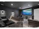 Cozy home theater features a large screen, comfortable seating, and elegant lighting at 267 S Clermont St, Denver, CO 80246