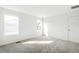 Bright, carpeted bedroom featuring a large window and neutral walls at 9283 Biscay St, Commerce City, CO 80022