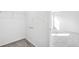 Storage closet with carpeted floor and shelves with easy access to additional storage at 9283 Biscay St, Commerce City, CO 80022