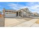 Charming two-story home featuring a two-car garage and modern architecture at 9283 Biscay St, Commerce City, CO 80022