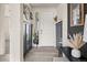 Stylish entryway with wainscoting, light wood floors, and decorative accents at 840 Avena Dr, Elizabeth, CO 80107