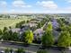 Aerial view of a residential neighborhood, showcasing tree-lined streets and well-maintained homes at 9266 E 35Th Ave, Denver, CO 80238