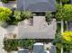 Aerial view of a home with a spacious layout surrounded by lush landscaping in a suburban neighborhood at 9266 E 35Th Ave, Denver, CO 80238