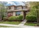 Charming two-story home with a landscaped front yard and stone accents on the facade at 9266 E 35Th Ave, Denver, CO 80238