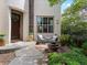 Inviting front porch with seating area and landscaping, perfect for relaxing outdoors at 9266 E 35Th Ave, Denver, CO 80238