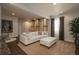 Spacious living room featuring modern décor, plush seating, and stylish accents at 9266 E 35Th Ave, Denver, CO 80238