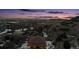 Aerial view of property with long driveway, outbuilding, patio, pool, and expansive views at 1140 Lake Gulch Rd, Castle Rock, CO 80104