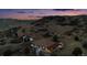 Aerial view of a mountainside property with panoramic view, home, and separate garage at 1140 Lake Gulch Rd, Castle Rock, CO 80104