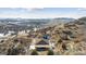 Expansive aerial view showcasing the home's outdoor entertaining area, pool and privacy at 1140 Lake Gulch Rd, Castle Rock, CO 80104