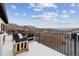 Outdoor back deck with mountain views and ample seating at 1140 Lake Gulch Rd, Castle Rock, CO 80104