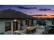 The backyard is a perfect retreat with pool, patio, lounge area, and mountain views at 1140 Lake Gulch Rd, Castle Rock, CO 80104