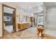 Modern bathroom with double vanity, walk-in shower, and freestanding tub at 1140 Lake Gulch Rd, Castle Rock, CO 80104