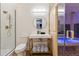 Modern bathroom featuring a vanity with a vessel sink and frameless shower stall at 1140 Lake Gulch Rd, Castle Rock, CO 80104