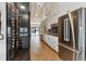 Modern kitchen featuring wine cellar, stainless steel appliances, and lots of counter space at 1140 Lake Gulch Rd, Castle Rock, CO 80104