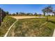 Community recreational area with a sand volleyball court, green space, and seating for outdoor enjoyment at 10 N Quantock St, Aurora, CO 80018