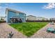 Expansive backyard with gazebo, patio, and privacy fence at 10 N Quantock St, Aurora, CO 80018
