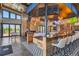 Inviting clubhouse featuring a modern bar area, stylish seating, and entertainment options for residents at 10 N Quantock St, Aurora, CO 80018