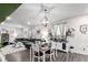 Open-concept dining area adjacent to the living room, perfect for Gathering gatherings at 10 N Quantock St, Aurora, CO 80018