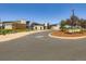 Modern community building with stone and wood accents, attractive landscaping, and inviting entrance at 10 N Quantock St, Aurora, CO 80018