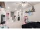 Upstairs loft with extra living space connecting secondary bedrooms and a laundry area at 10 N Quantock St, Aurora, CO 80018