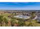 A beautiful aerial view shows community pool, playground and green spaces at 13912 Ashgrove Cir, Parker, CO 80134