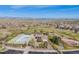 This elevated view shows a pool, splash pad, playground and neighborhood at 13912 Ashgrove Cir, Parker, CO 80134
