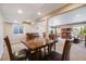 Basement with carpet, a large dining table, and a pool table in the background at 13912 Ashgrove Cir, Parker, CO 80134