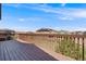 This wooden deck provides a view of nearby homes in a friendly neighborhood at 13912 Ashgrove Cir, Parker, CO 80134
