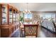 Elegant dining room with china cabinet and access to deck, perfect for Gathering gatherings at 13912 Ashgrove Cir, Parker, CO 80134