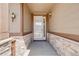 Covered front porch with stone accents, offering an inviting entry to the home at 13912 Ashgrove Cir, Parker, CO 80134