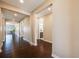 Spacious entry hallway with hardwood floors and neutral paint tones at 13912 Ashgrove Cir, Parker, CO 80134