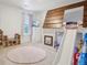 bedroom features a custom bunk bed with slide, creating a fun and functional space at 715 N Amory St, Watkins, CO 80137