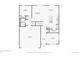 First floor plan featuring a kitchen, living room, dining room, office, and garage at 715 N Amory St, Watkins, CO 80137