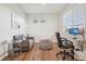 Cozy living room space with stylish seating, and desk perfect for relaxation and work at 715 N Amory St, Watkins, CO 80137