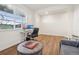 This living room features a chess table and seating for relaxing or entertaining at 715 N Amory St, Watkins, CO 80137