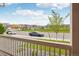 Peaceful street view from the porch showcases the well-kept neighborhood and community park across the street at 715 N Amory St, Watkins, CO 80137