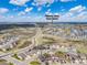 Aerial view of a neighborhood close to open spaces, parks, and ponds at 880 Mcmurdo Cir, Castle Rock, CO 80108