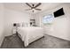 Bedroom with a view from the window, ceiling fan and a TV at 880 Mcmurdo Cir, Castle Rock, CO 80108