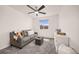 Cozy bedroom with carpet floors and a bright window at 880 Mcmurdo Cir, Castle Rock, CO 80108