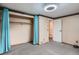 Simple bedroom features carpet, a closet, and a view into the bathroom at 30839 Manitoba Dr, Evergreen, CO 80439